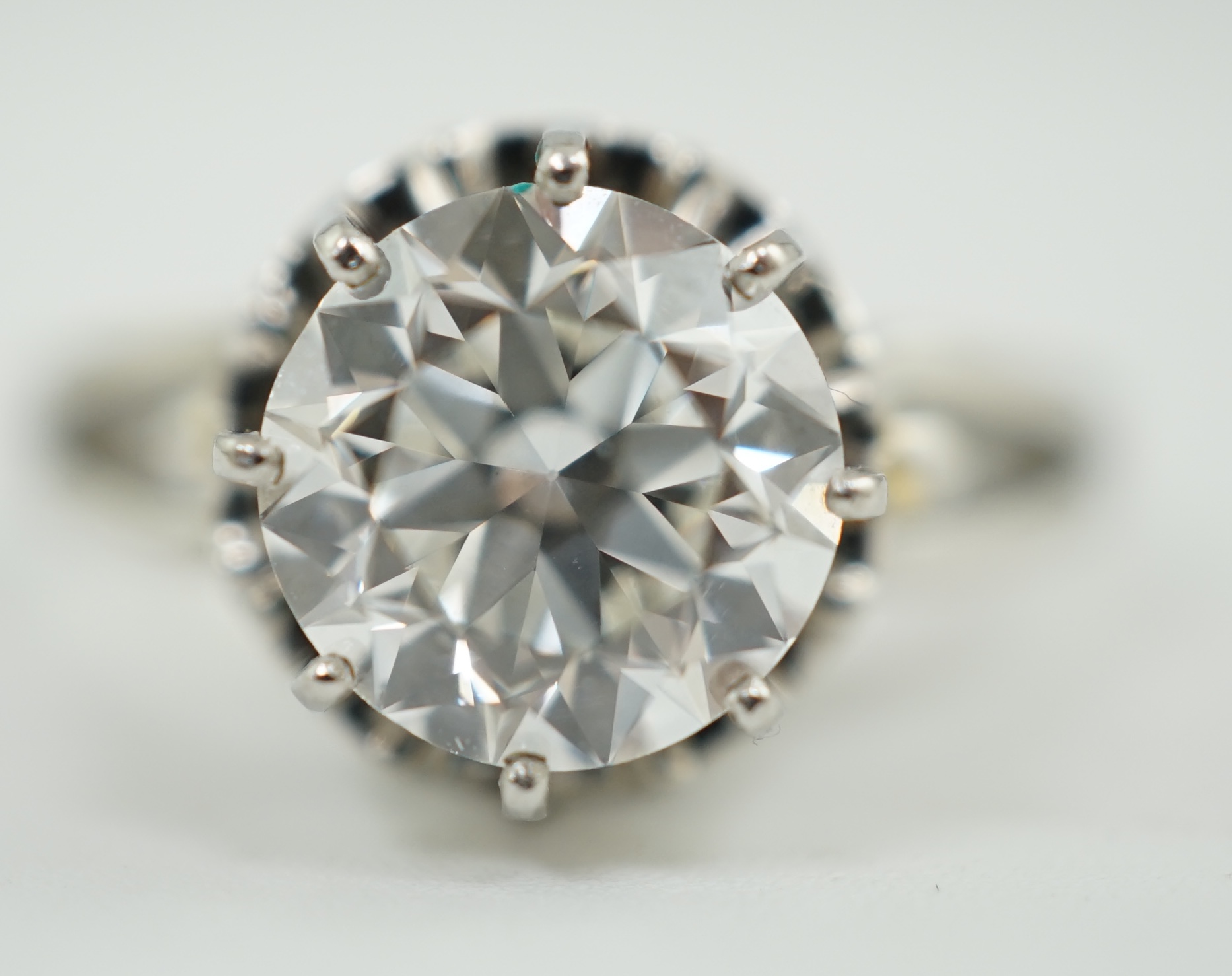 A platinum and solitaire diamond set ring